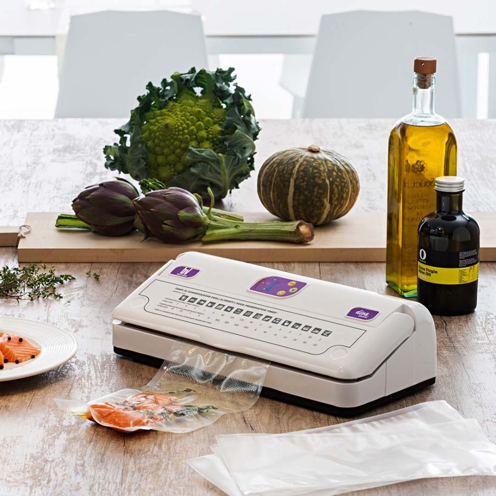 EMPACADORA AL VACÍO BESSER 
VACUUM DIVA | Empacadora al Vacío | Barra Sellado de 33 cm | Polimero | Negocio Alimentos Jamones Caldos Cremas Ambientada