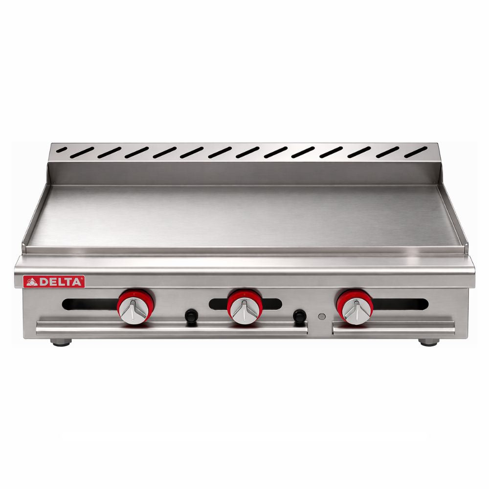 Plancha Delta 3-G, en acero inoxidable.